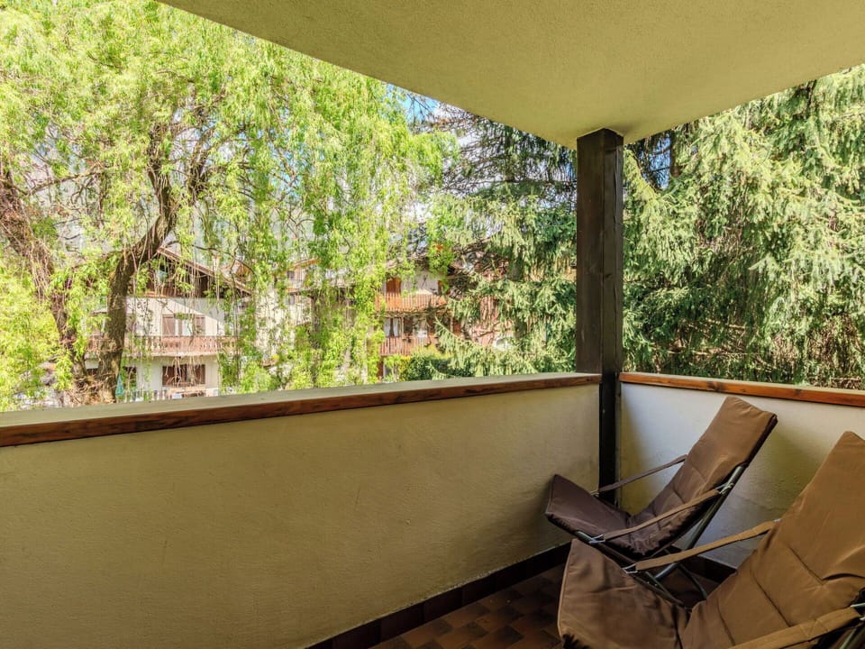 Wood, Ceiling, Interior Design, Floor, Wood Stain, Shade, Hardwood, Porch, Chair, Eco Hotel