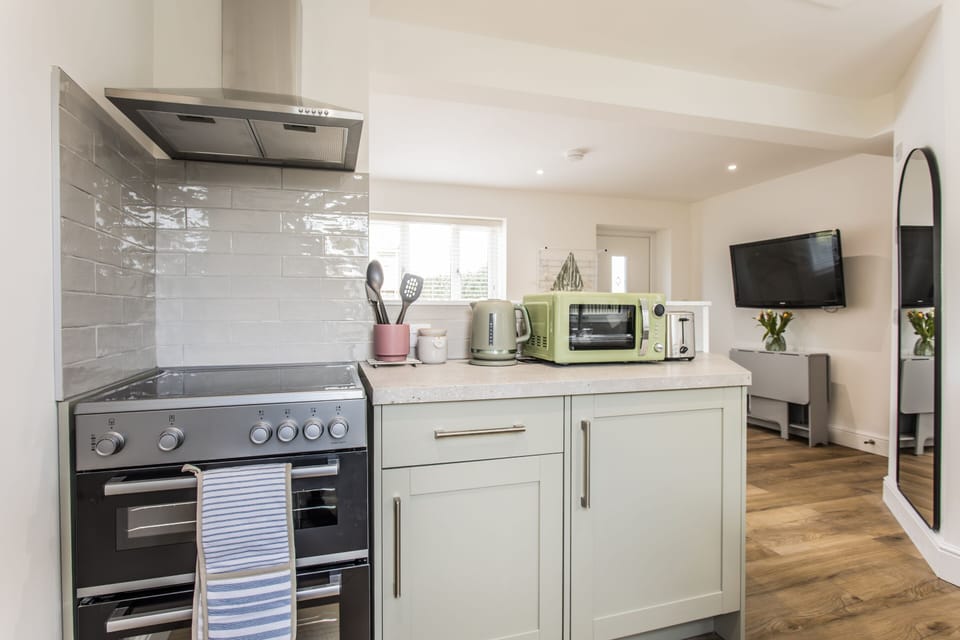 Studio with open plan kitchen/bedroom and dining area