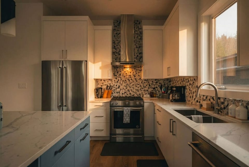 Full kitchen with a drip coffee machine, ground coffee, tea, sugar and basic condiments (ketchup, mustard and relish.)