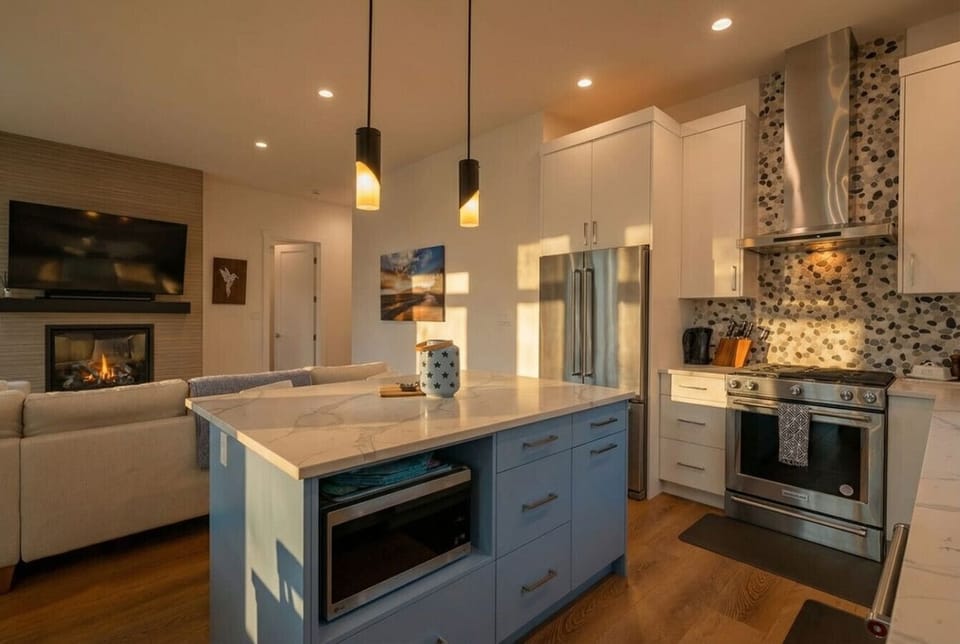 Full kitchen with a drip coffee machine, ground coffee, tea, sugar and basic condiments (ketchup, mustard and relish.)