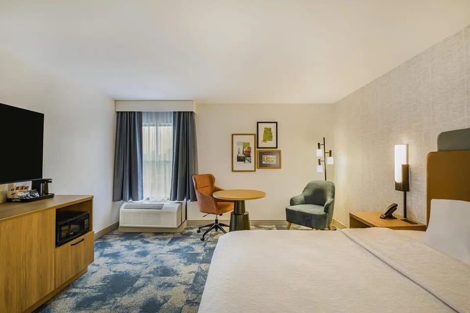 Settle into the cozy seating nook by the window light