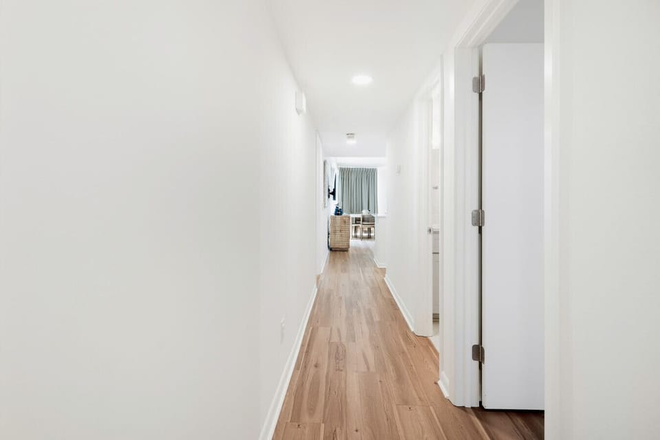 Entrance of Condo, Guest bed & bath on right with Master on left