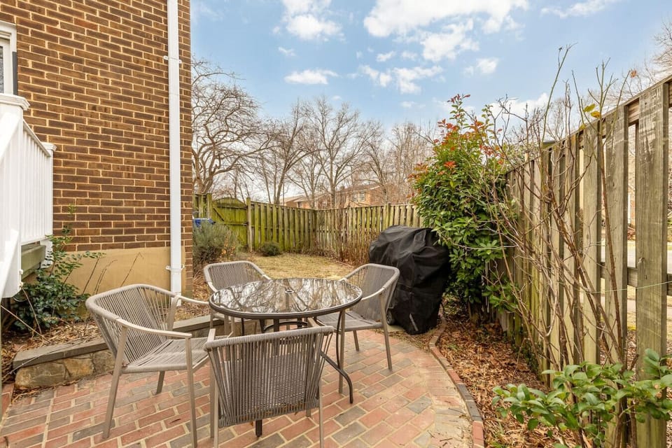 Fenced In Backyard with BBQ Grill