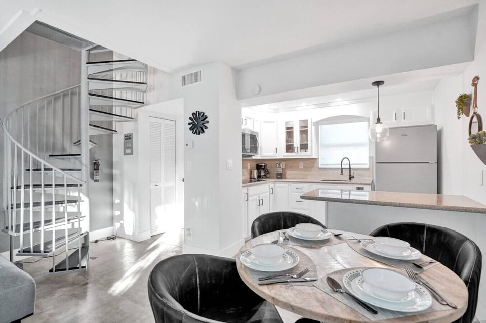 Spacious Kitchen with Bar Seating — Cook & Gather Easily