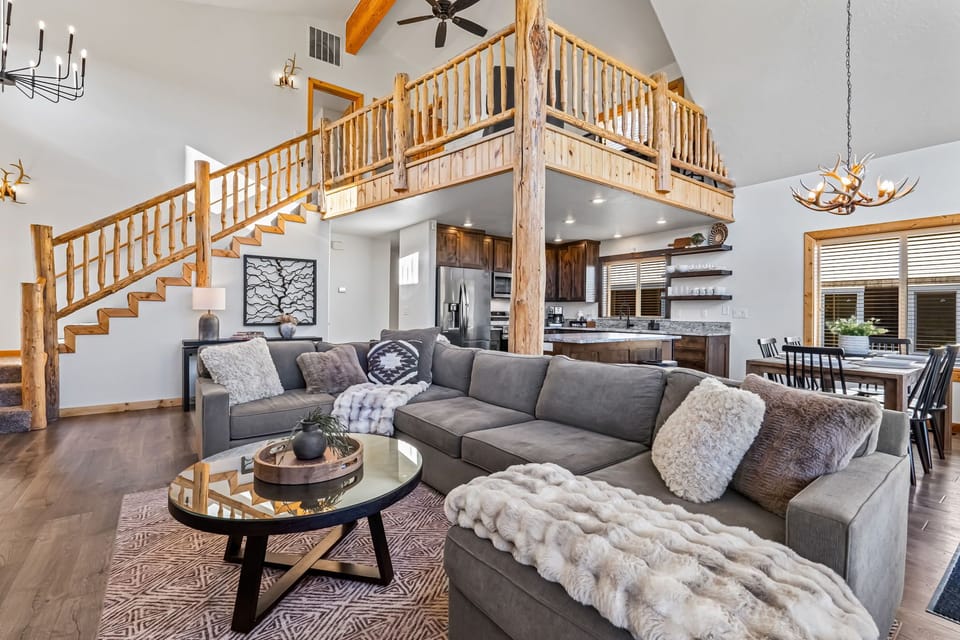 Spacious layout connecting living, dining, and kitchen areas.