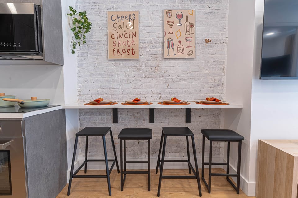Breakfast bar for four with exposed brick and stylish decor