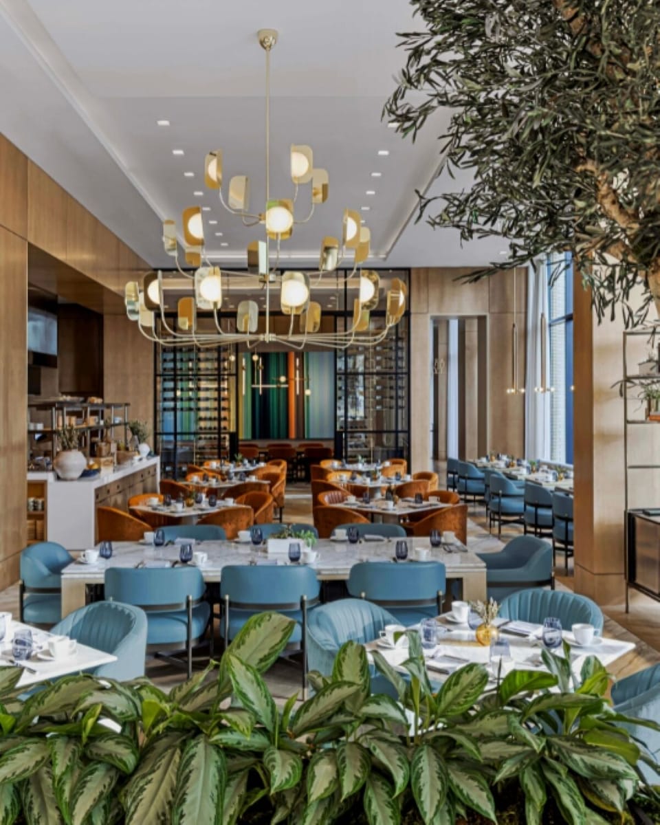 Dine in style under statement lighting and polished designer finishes.