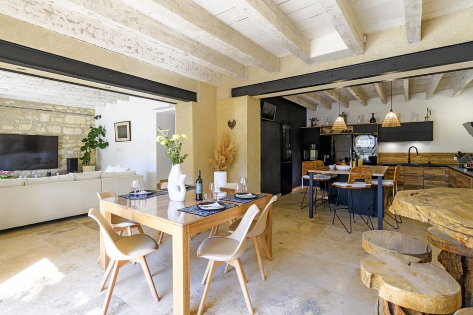 The living area combines dining room, lounge and