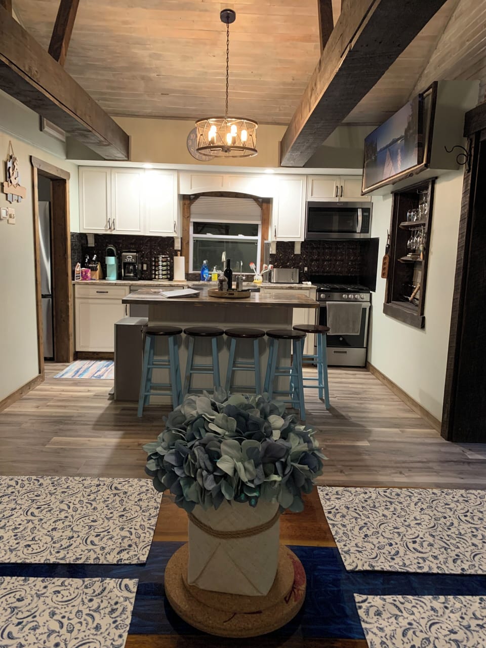 Kitchen & island view from dining room table.