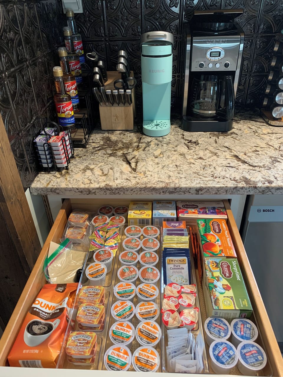 Coffee bar: coffee, tea, hot chocolate, sugar, creamer, syrups, jellies, &butter