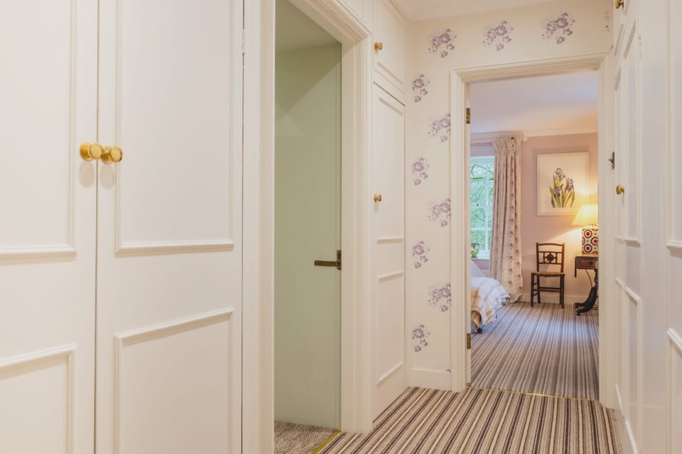 Leading through to the ground floor bathroom and bedroom