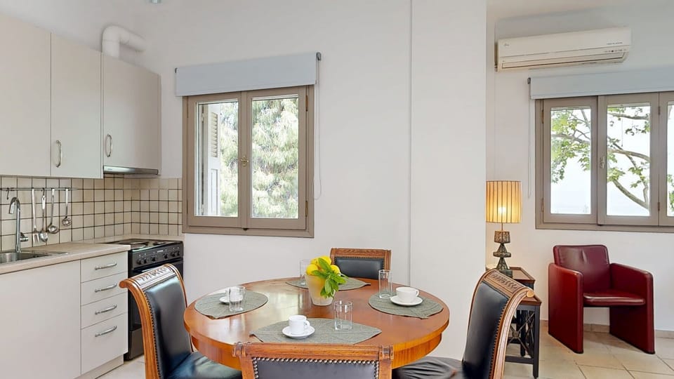 Living and Dining Area with Large Windows