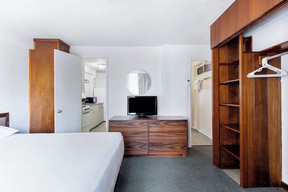 Settle in with generous storage and TV for cozy nights.