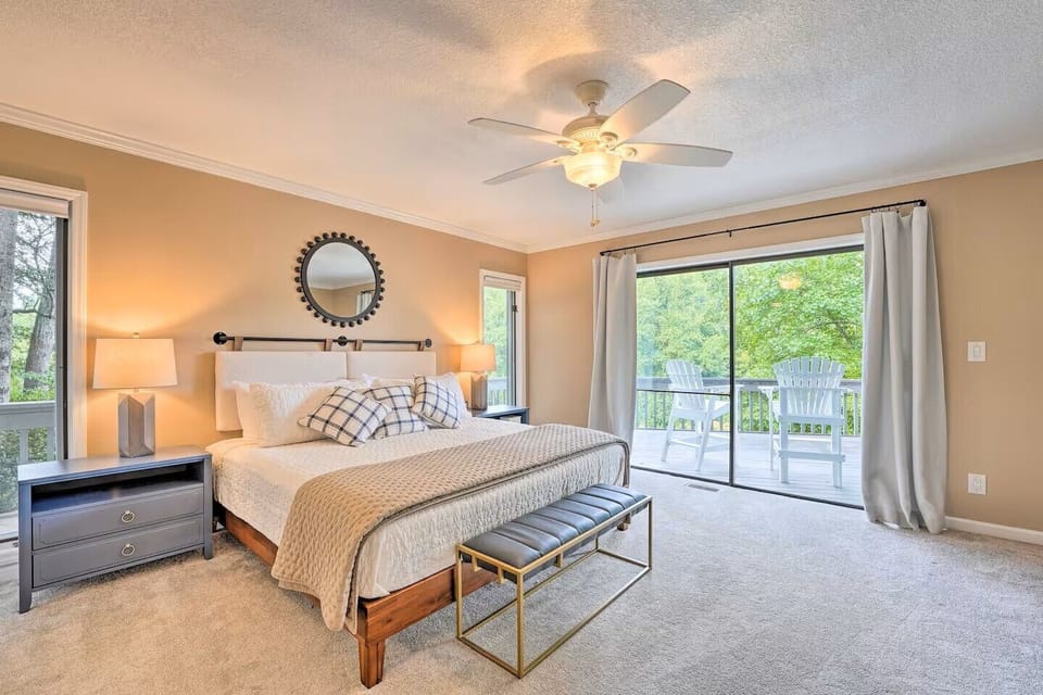 Bright and welcoming main-level bedroom with a plush king bed.