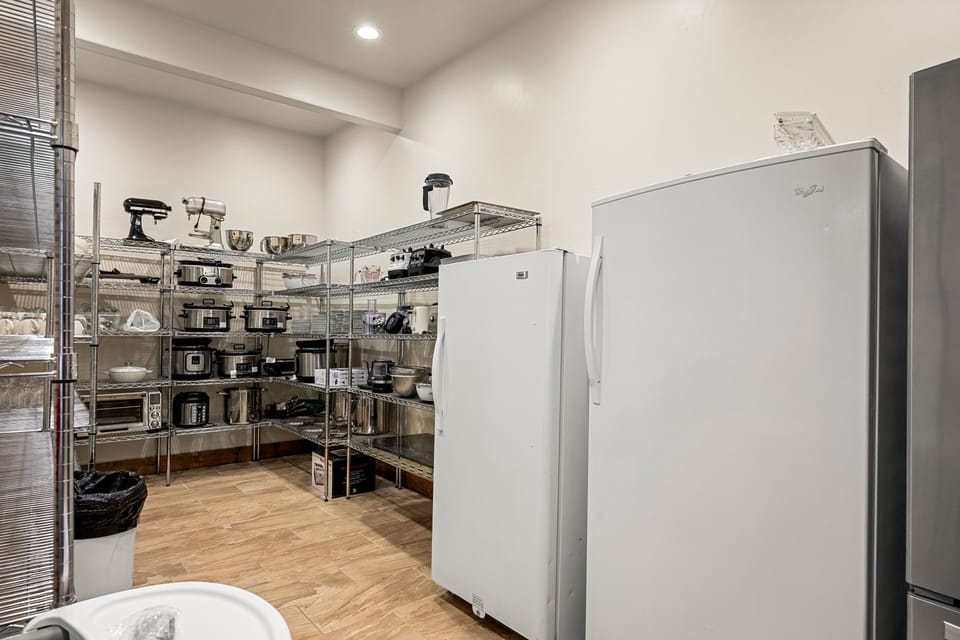 Your shared kitchen is fully stocked with small appliances like stand mixers, slow cookers, blenders, and coffee makers—everything you need to whip up a delicious meal during your stay.
