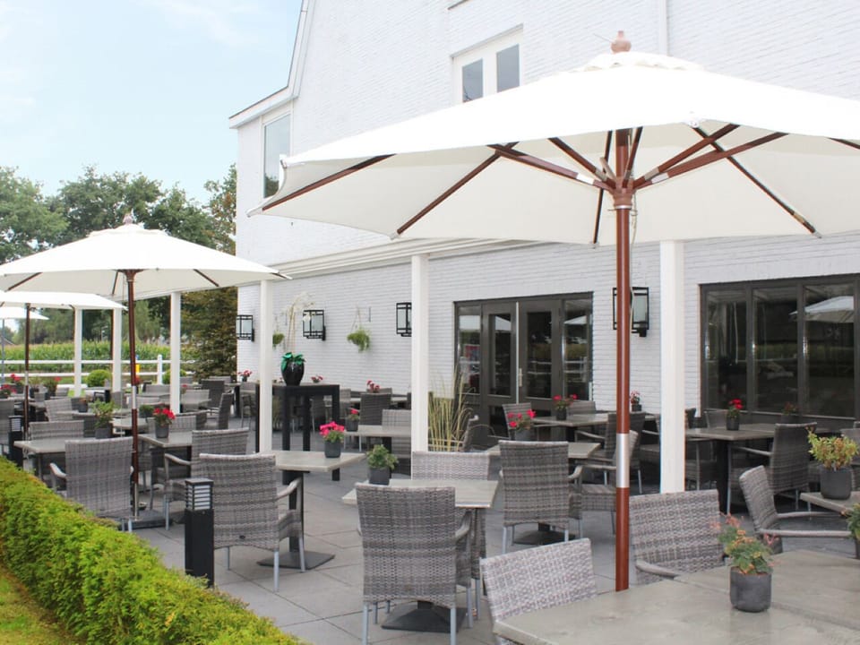 Unwind on the sunny terrace with drinks and conversation.