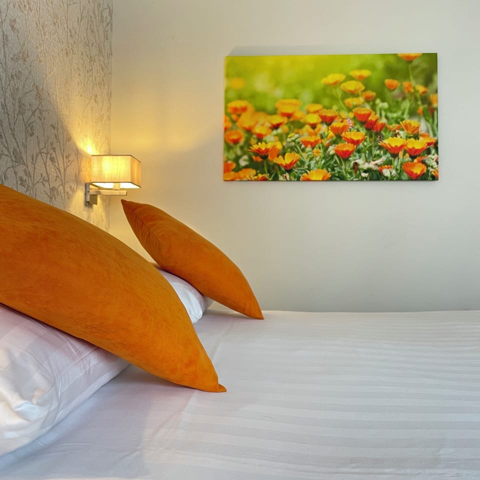 Snuggle into plush pillows under warm lighting for total calm.