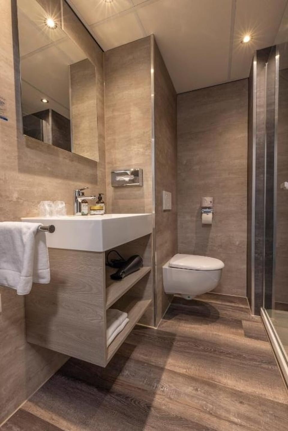 Unwind in a spotless, spa-like bathroom with walk-in shower.