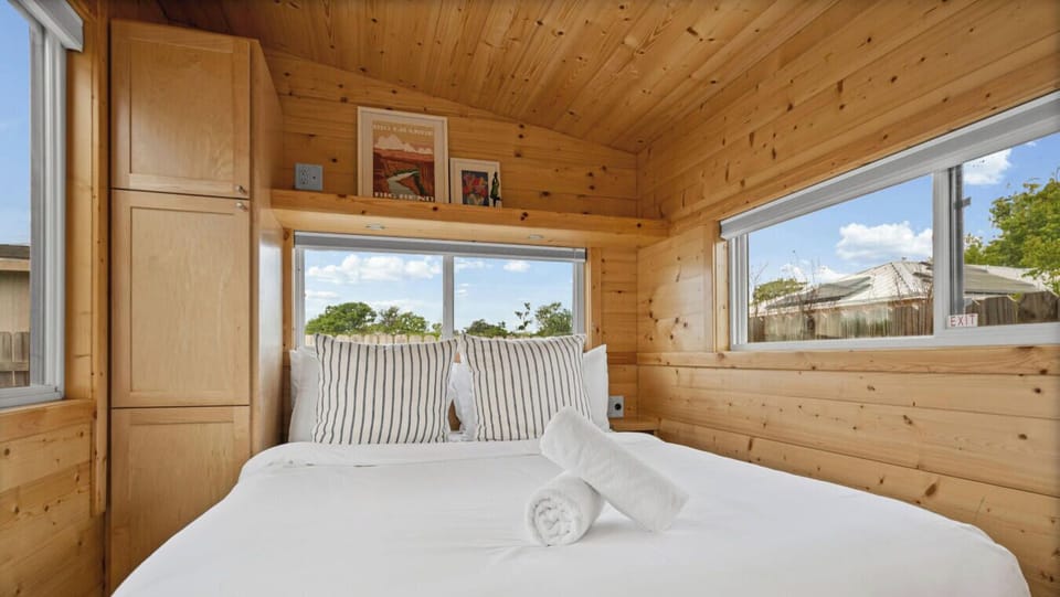 Pull-down shades provide dark coverage for sleeping.