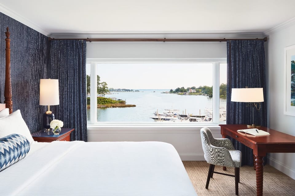 Wake up to sparkling water views from your dreamy bed.