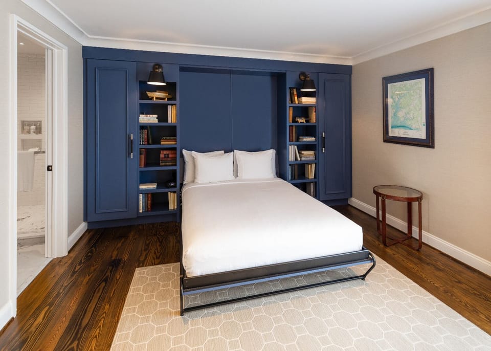 Recharge in a cozy nook framed by custom built-ins.