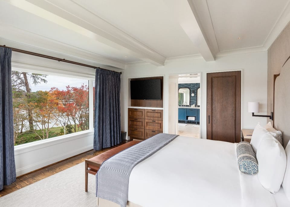 Sink into crisp linens and drift off with tranquil views.