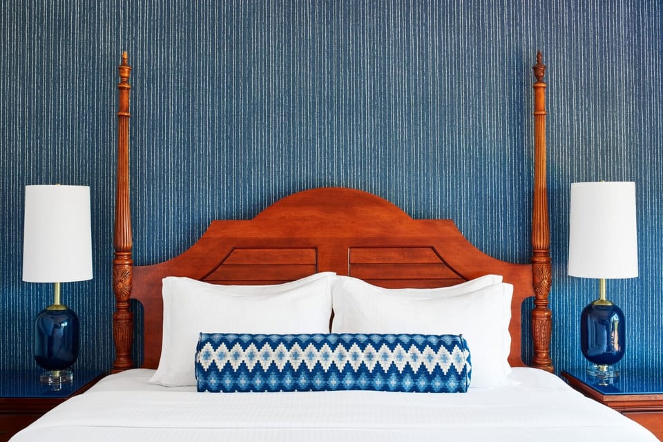 Indulge in boutique-hotel comfort with elegant bedside lighting.