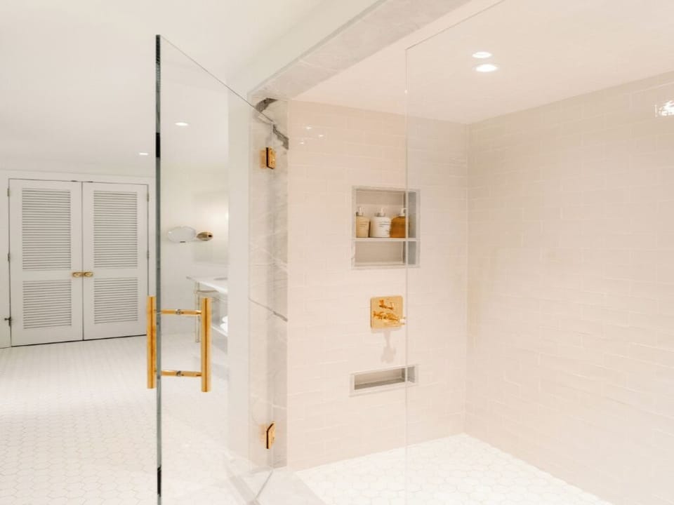 Rinse off in a spacious walk-in shower, hotel-fresh.