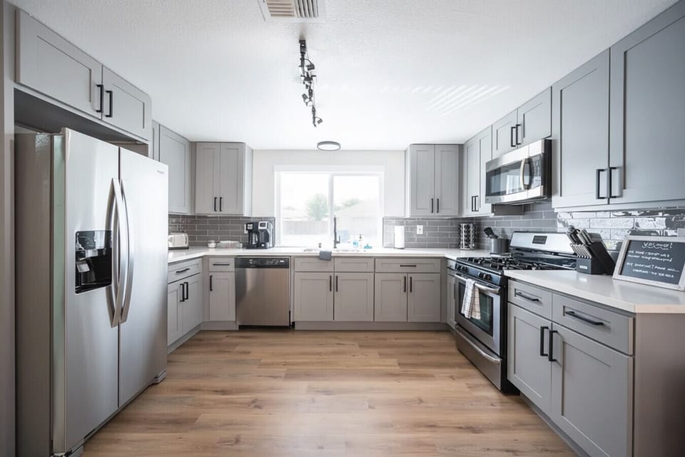 The full kitchen includes everything you need to cook meals yourself (if you choose) or to store leftovers from the many delicious restaurants nearby `