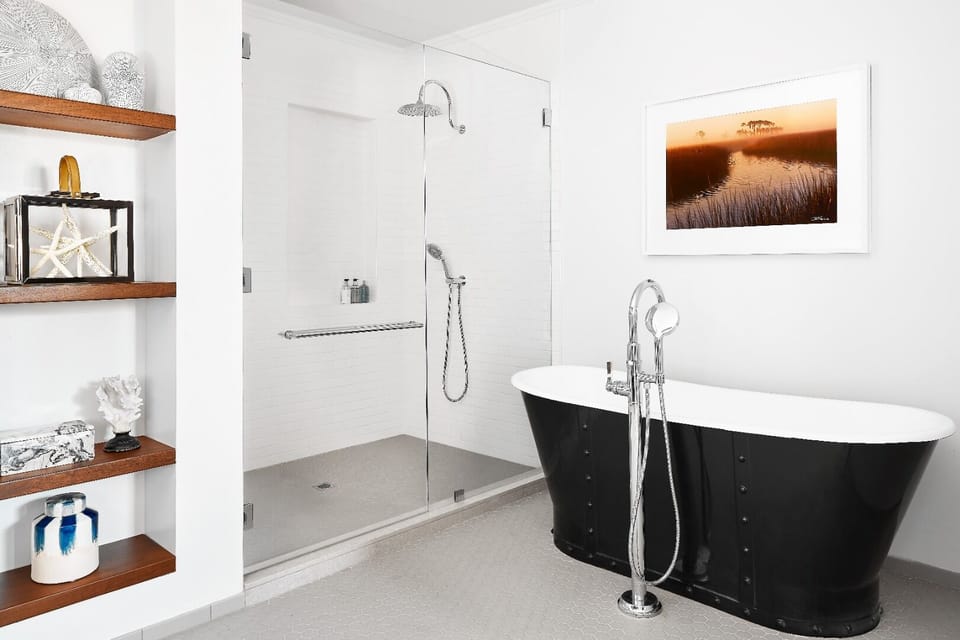 Unwind in a spa-like soak beside the walk-in shower.