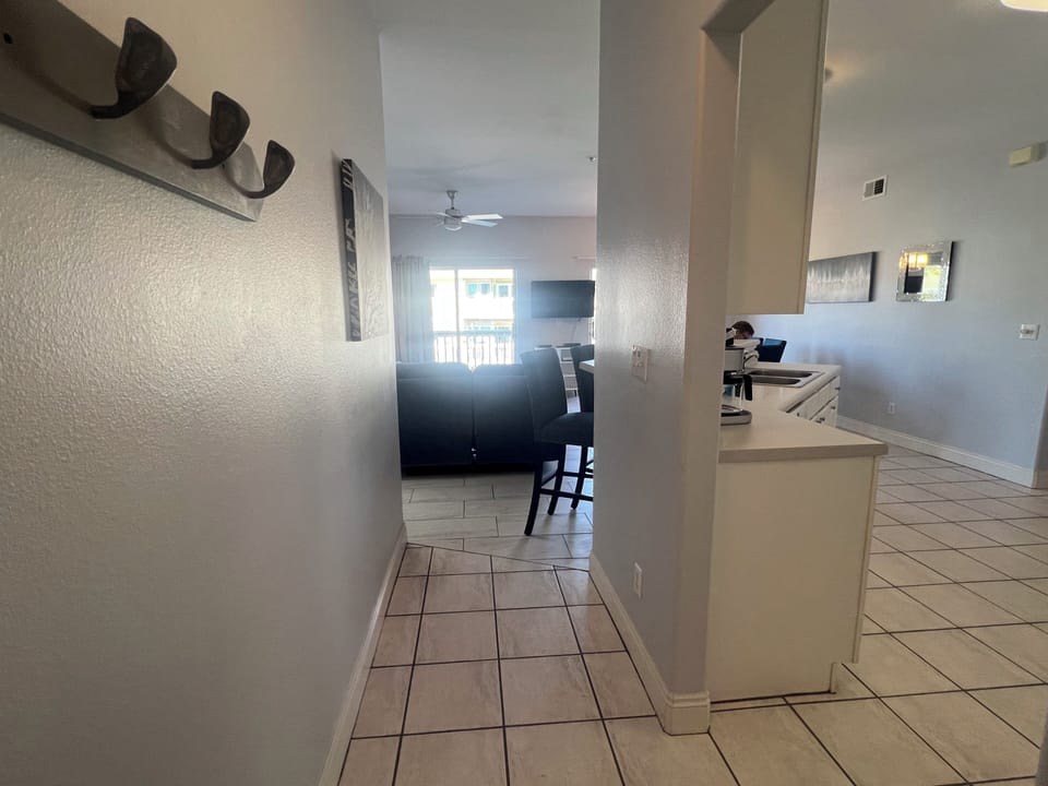 Step into your bright, open-concept space where the kitchen flows seamlessly into your living area, creating the perfect home base.