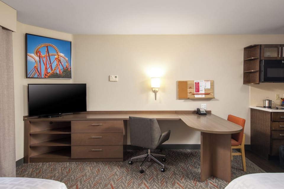 Settle in at the spacious desk for focused work time.