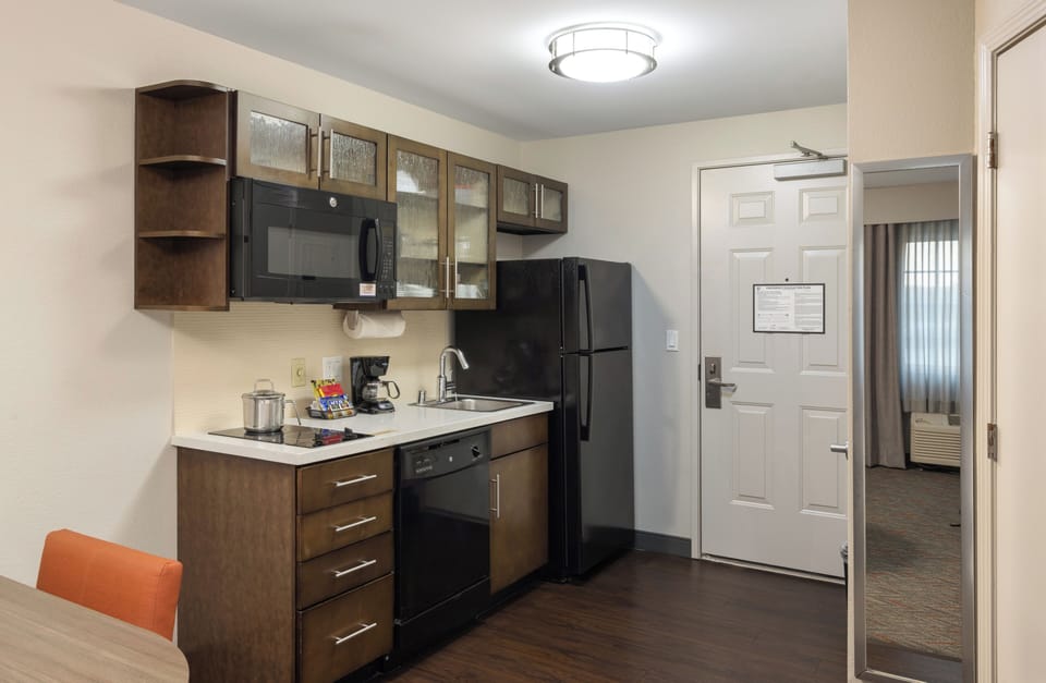 Cook and snack easily in a fully equipped, modern kitchenette.