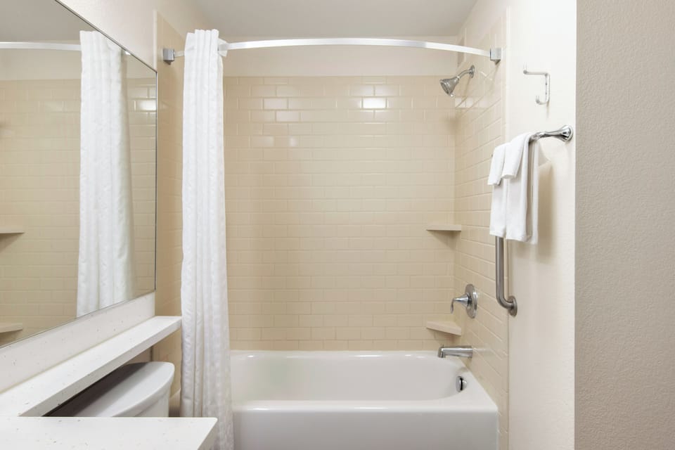 Refresh with a clean, bright bath and soothing hot shower.