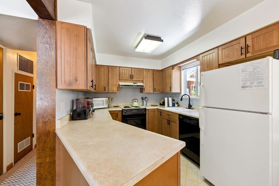 Cozy kitchen with ample counter space and natural light