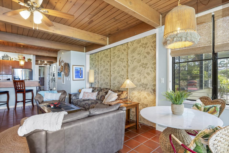 Spacious living room with cozy seating and natural light