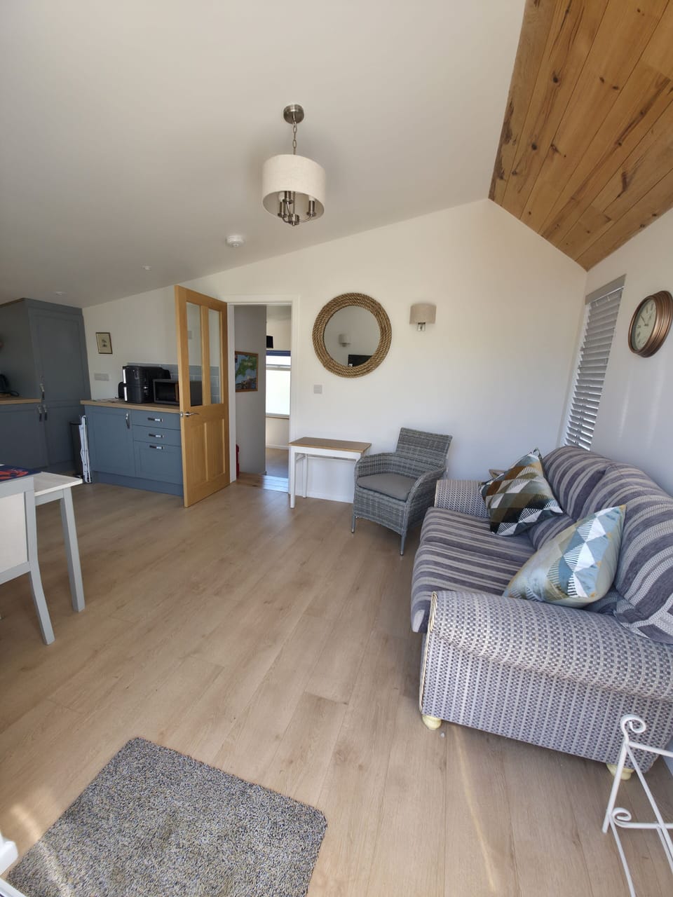 Comfortable living space with sofa and TV