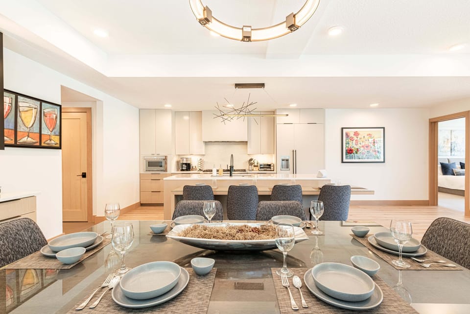 Dining room table seats 8-10. Bar area is immediately adjacent.
