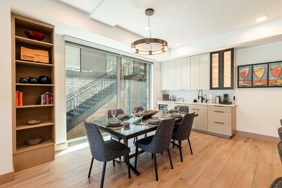 Dining room table seats 8-10. Bar area is immediately adjacent.
