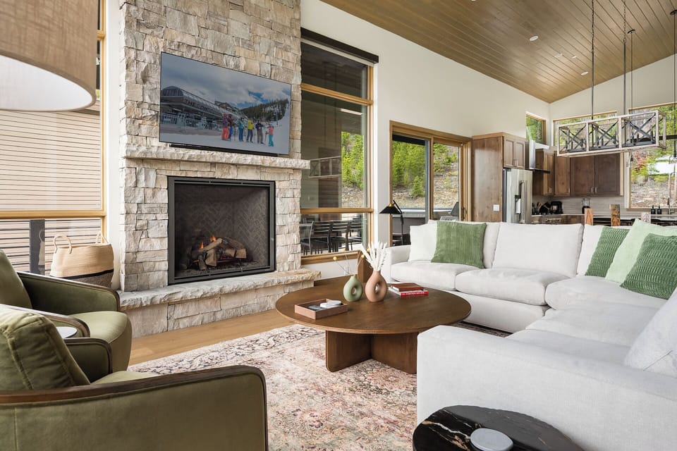 Fireplace and large flat screen TV in the living area