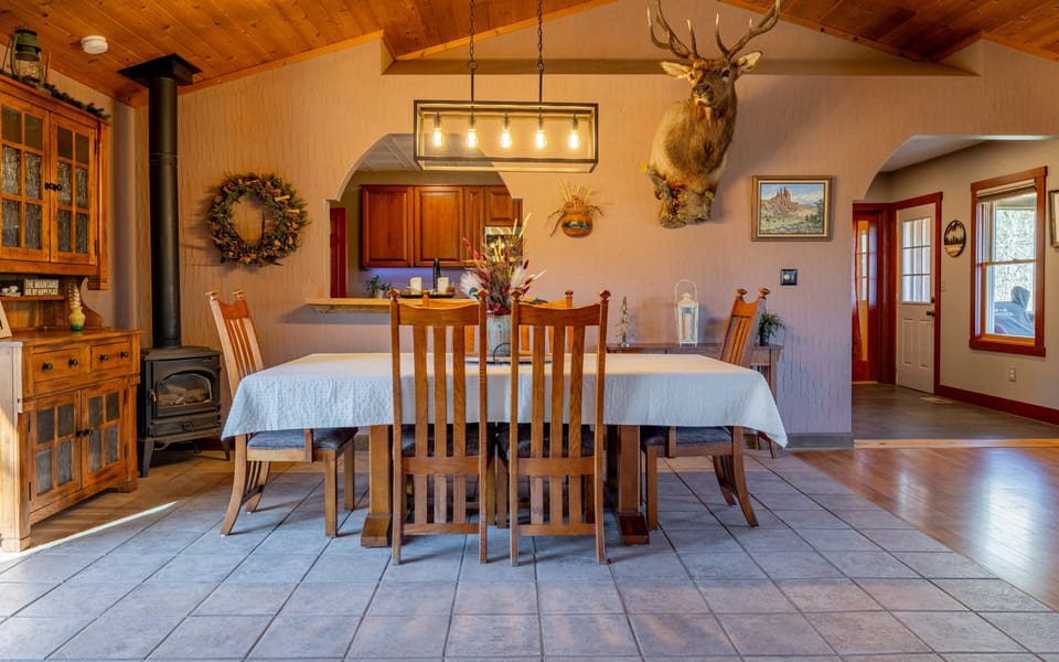 Warm wood finishes combine with Western decor for a comfortable feel throughout the home