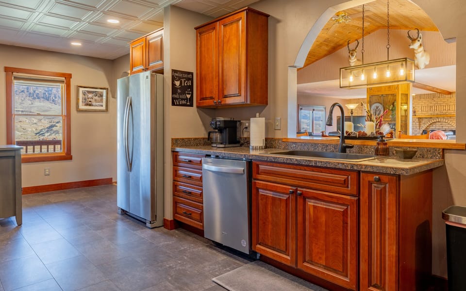 The kitchen with modern appliances makes preparing and cleaning up meals a pleasure