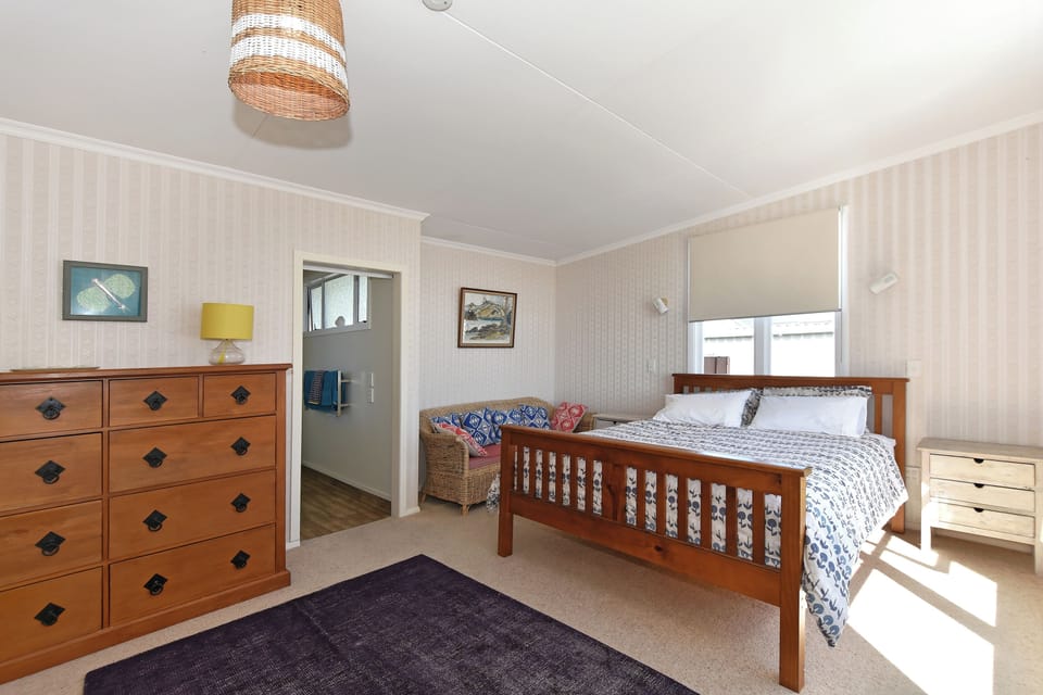 Master bedroom with door to ensuite bathroom
