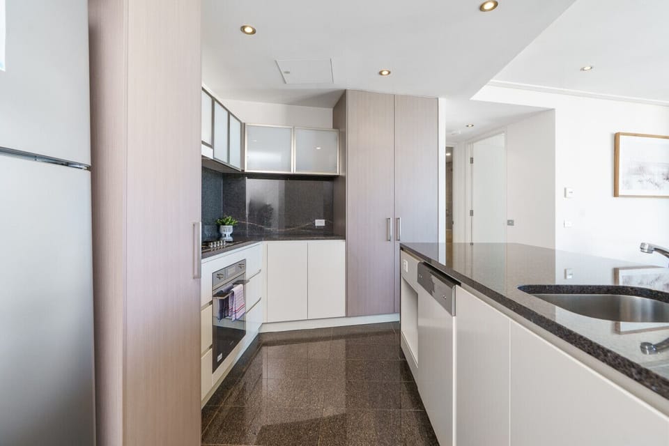 A sleek and well-appointed kitchen with everything you need to prepare meals with ease during your stay.