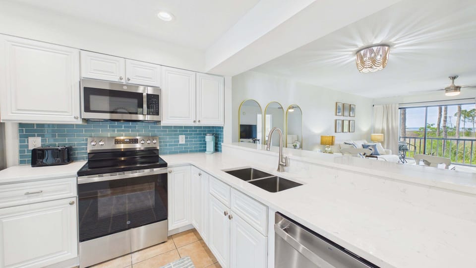 Full kitchen with stainless appliances and all the cooking essentials