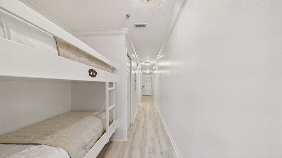 Twin-over-twin bunk beds in hallway (sleeps 2)