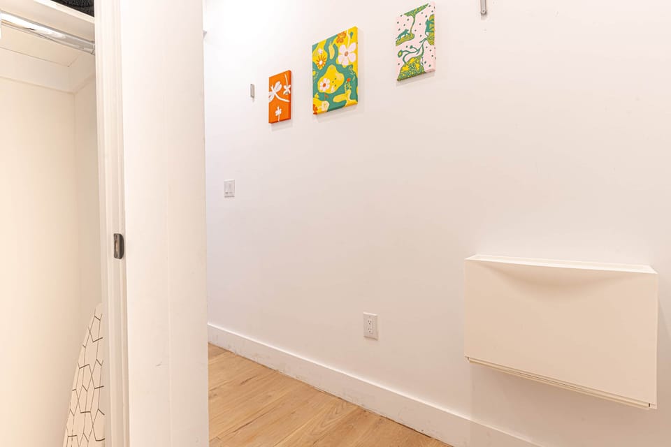 Minimalist hallway with warm floors and clean modern design