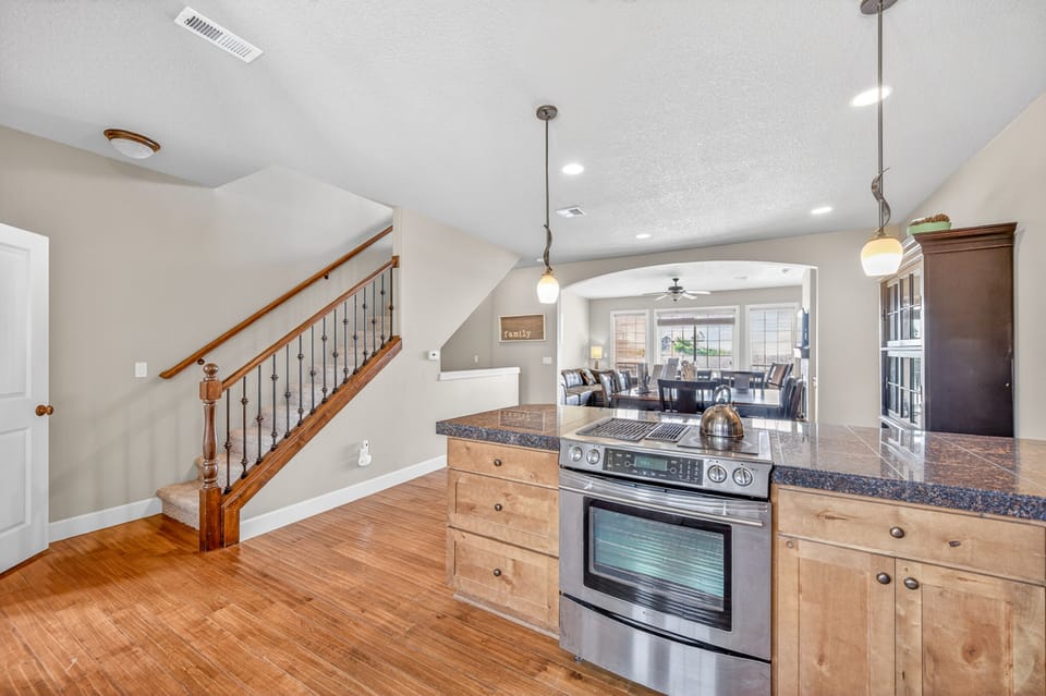 Your spacious kitchen flows seamlessly into the living areas, creating the perfect space for cooking and gathering with loved ones.