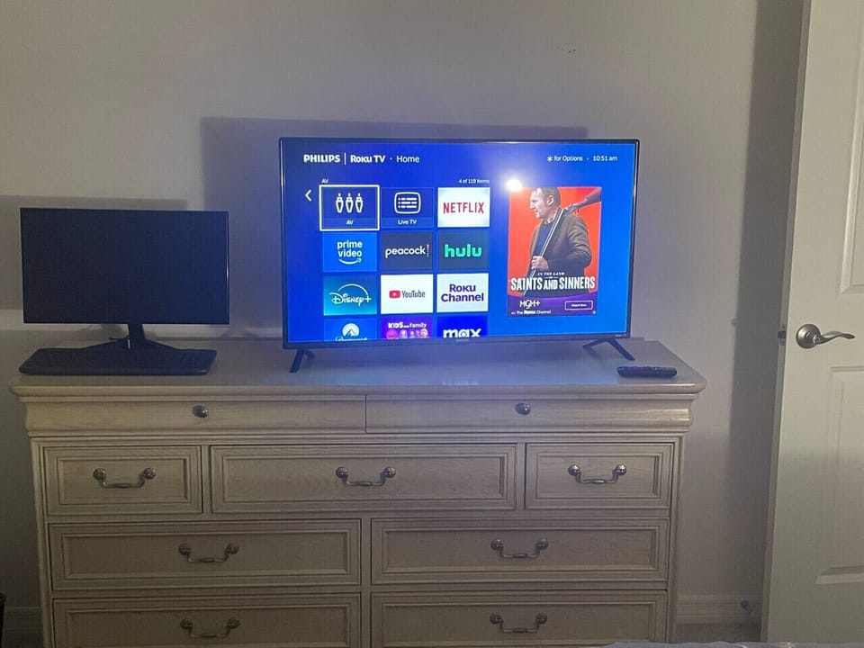 40 inch Roku Smart TV with streaming apps available and Live TV.  Also computer monitor available for use to hook to your laptop.