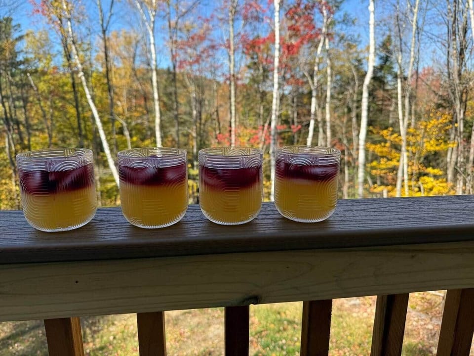 Enjoy drinks overlooking the backyard and the mountains beyond. 